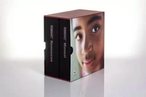 Box featuring child's face and RMHC manuals.