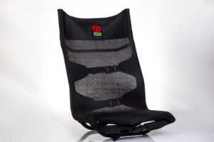 Black ergonomic mesh chair backrest support.