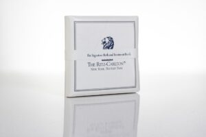 Ritz-Carlton soap packaging on white background.