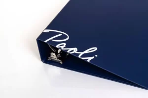 Blue binder with white script text.