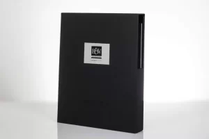 Black folder with B&W logo on cover.