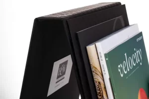 Magazine holder with various magazines inside.