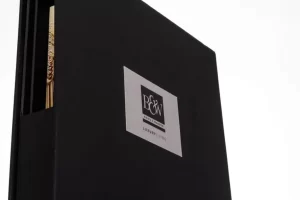 Black box with gold detail inside.