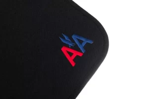 Red and blue "AA" embroidery on fabric.