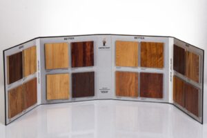 Wood veneer samples displayed in a booklet.