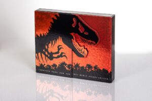Dinosaur silhouette on red and black box.