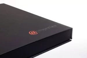 Black book with orange @properties logo.