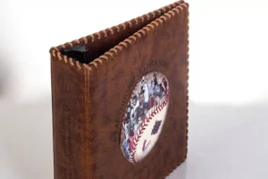 Leather baseball-themed binder with embroidered details.
