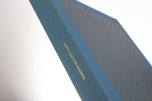 Blue book cover with gold lettering detail.