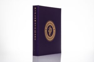 Purple diplomate certificate cover with gold emblem.