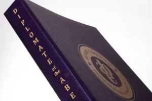 Purple book with gold embossed spine text.