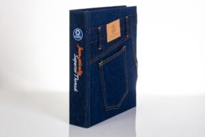 Denim-bound book resembling jeans with pocket.