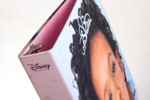 Disney Princess binder with child's face design.