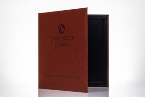 Brown menu cover with Camelback Lodge logo.
