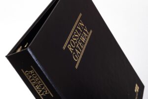 Black binder labeled "Rosslyn Gateway" in gold.