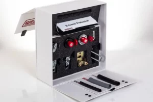 Protective equipment kit with various components displayed.