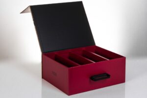 Red storage box with open compartments.