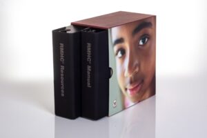 Binders with a child's portrait on cover.