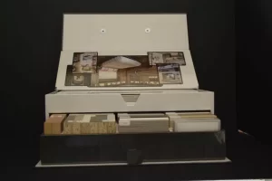Box of architectural design samples and images.
