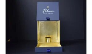 Blue Baja Grill box with candle inside.