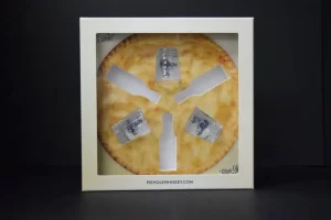 Pie box with whiskey bottles inside.