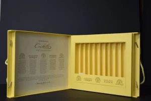 Yellow open box with slotted compartments.