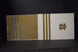 Gold and white ND branded box. Gold and white ND branded box.