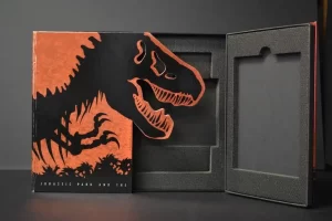 Jurassic Park book with T-Rex silhouette.