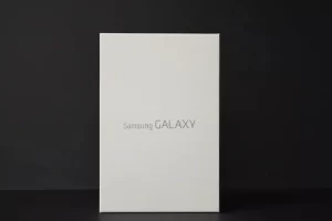 Samsung Galaxy phone box on black background.