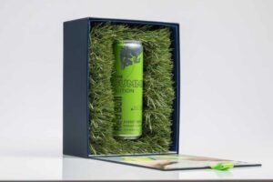 Green energy drink can in gift box.