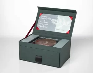 Green gift box with thank you card.