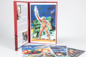 He-Man book with colorful illustrated pages.