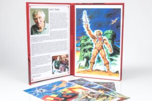 Book open displaying fantasy artwork and text.