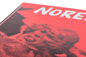 Red book cover with pixelated design.