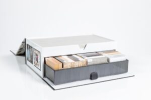 Sample box with various material swatches.