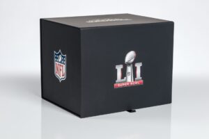 Black box with NFL Super Bowl logo.