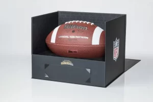 NFL football in display box.