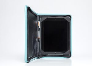 Tablet in turquoise case with pen holder.