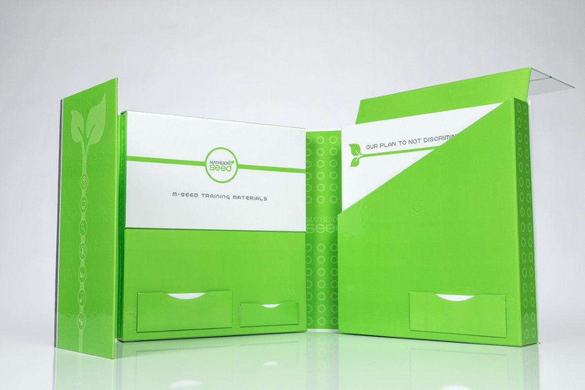 Green eco-friendly packaging with leaf design.
