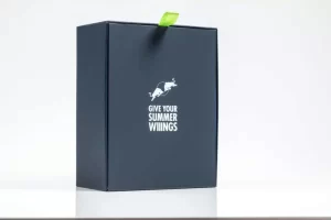 Dark box with logo and green tab.