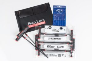 Tools and Fred Loya Insurance envelope displayed.