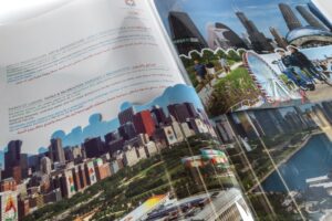 Brochure with Chicago landmarks and text.