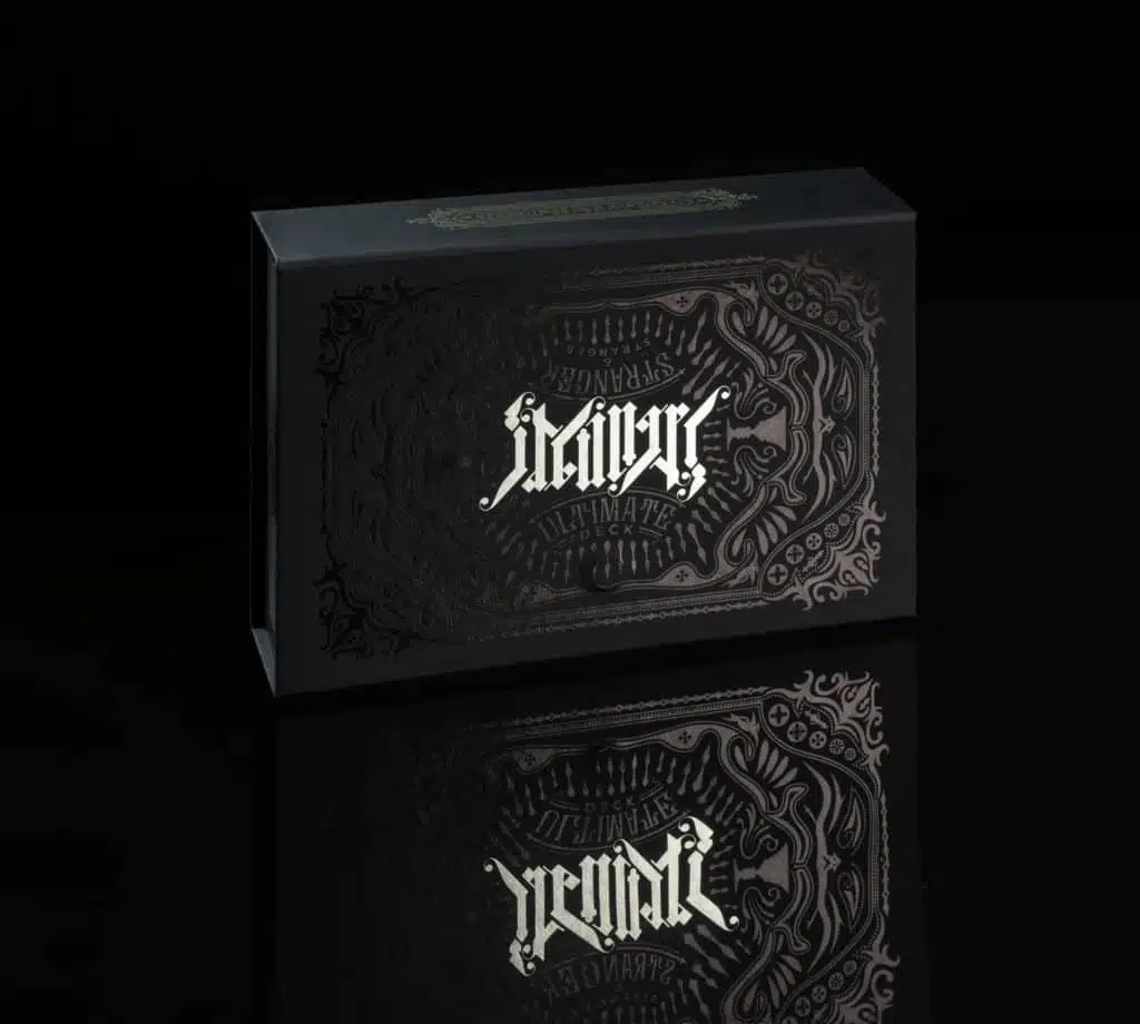 Ornate black box with intricate silver design.