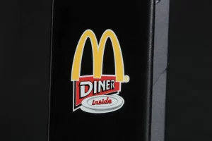 Black object with McDonald's Diner logo.