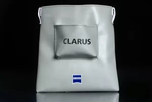 Gray Zeiss Clarus bag against black background. Gray Zeiss Clarus bag against black background.