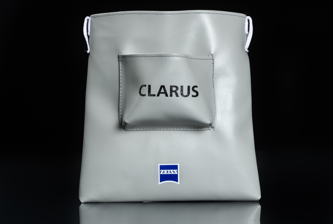 Gray bag with "CLARUS" and "ZEISS" logos.