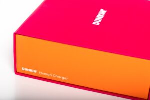 Dunkin' Human Charger box, pink and orange.