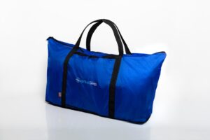 Blue duffel bag with black handles.