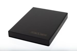 Black rectangular box with gold text.