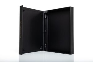 Open black DVD case on white background.